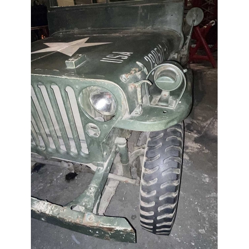 891 - ± Britain in the Blitz Willys MB Jeep A World War II period Willys MB Military Jeep with rear canvas... 