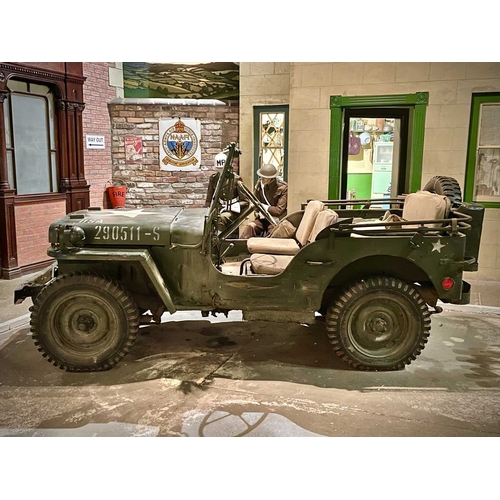 891 - ± Britain in the Blitz Willys MB Jeep A World War II period Willys MB Military Jeep with rear canvas... 