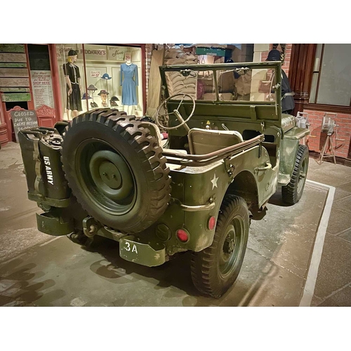 891 - ± Britain in the Blitz Willys MB Jeep A World War II period Willys MB Military Jeep with rear canvas... 