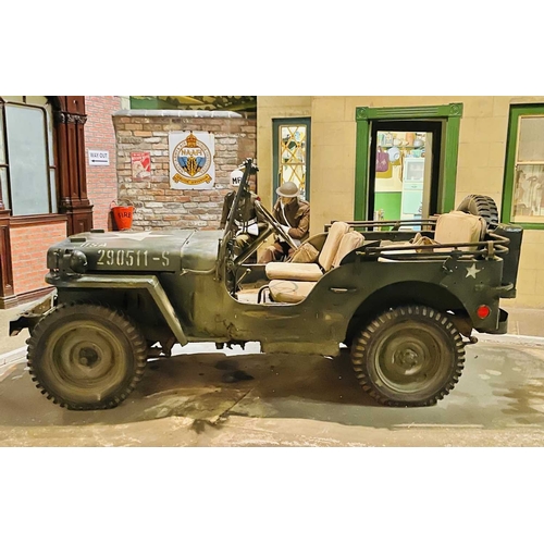 891 - ± Britain in the Blitz Willys MB Jeep A World War II period Willys MB Military Jeep with rear canvas... 