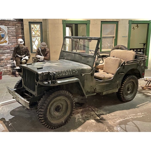 891 - ± Britain in the Blitz Willys MB Jeep A World War II period Willys MB Military Jeep with rear canvas... 