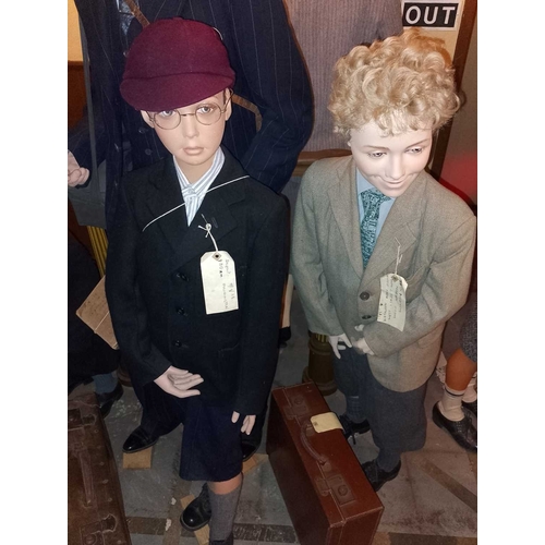 980 - ± Britain in the Blitz Evacuees A gentleman and four boys, each with period-style clothing. - This l... 