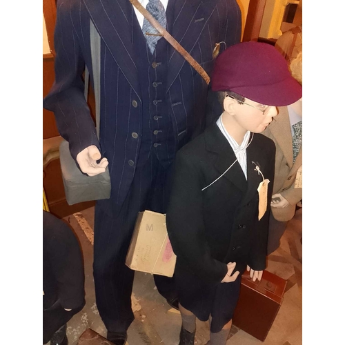 980 - ± Britain in the Blitz Evacuees A gentleman and four boys, each with period-style clothing. - This l... 