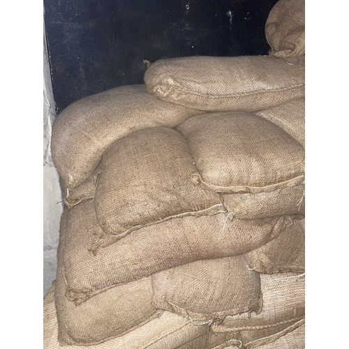 999 - ± Britain in the Blitz Sandbags, approx. 950 Approximately 950 filled sandbags situated along the en... 