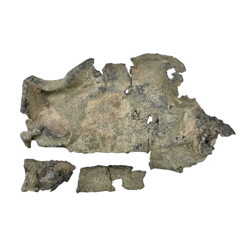 11 - A Medieval lead coffin shaped ampulla. (Fragments), with PAS report, together with a lead scallop sh... 