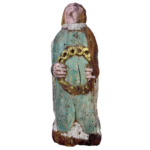 114 - Two 17th century French carved wood polychrome painted figures. The taller figure depicted with a bo... 