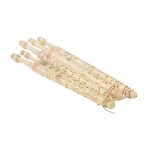 115 - A collection of five 19th century bone lace bobbins. Named or inscribed, length 9cm.