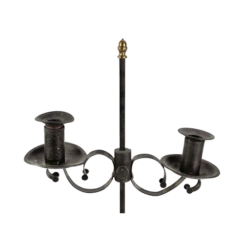 117 - A painted tin and wrought iron adjustable candelabrum. 19th century, with a brass acorn finial, on a... 