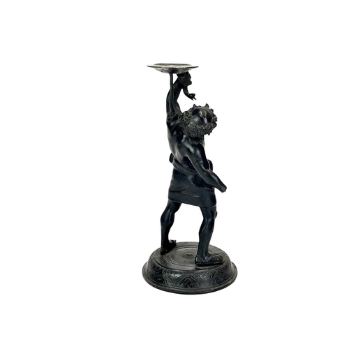 120 - An Italian bronze figure of Bacchus. Circa 1900, supporting a snake above his head, on a circular ba... 