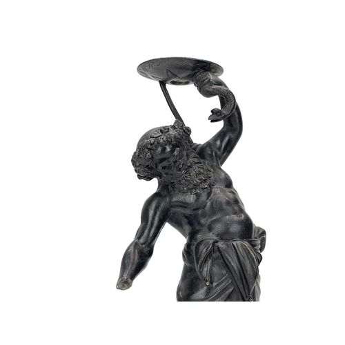 120 - An Italian bronze figure of Bacchus. Circa 1900, supporting a snake above his head, on a circular ba... 