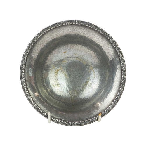 126 - A pair of Liberty & Co Tudric hammered pewter pedestal bowls. No. 01353. Height 4.5cm, 17cm diameter... 