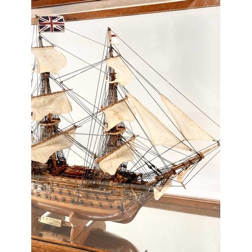 2 - A wood model of HMS Victory. Along with a similar sectional model, in a glazed case. Height 54cm, wi... 