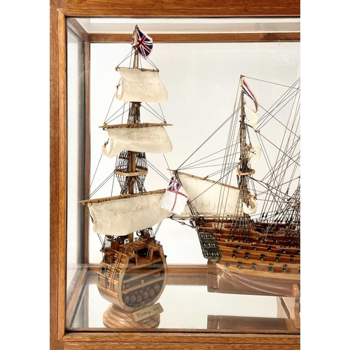 2 - A wood model of HMS Victory. Along with a similar sectional model, in a glazed case. Height 54cm, wi... 