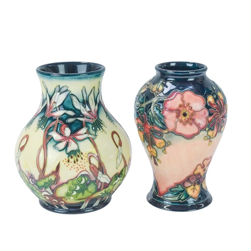 229 - Two Moorcroft vases. One in the 'Oberon' pattern, date stamped for 1998, height 15.5cm and one in th... 