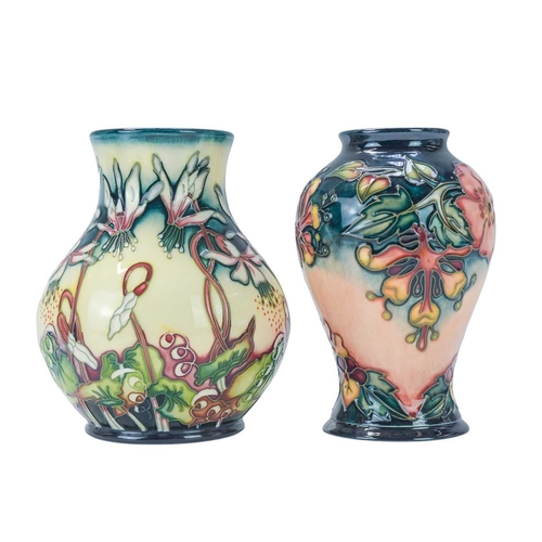 229 - Two Moorcroft vases. One in the 'Oberon' pattern, date stamped for 1998, height 15.5cm and one in th... 