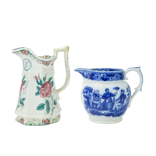 230 - Two 19th century documentary pearlware jugs. One a puzzle jug inscribed MC, height 21.5cm, the other... 