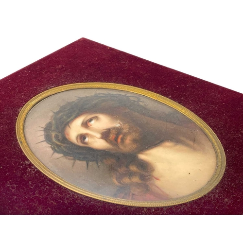 232 - A German porcelain oval painted plaque. Late 19th century, painted Christ with a crown of thorns, 16... 