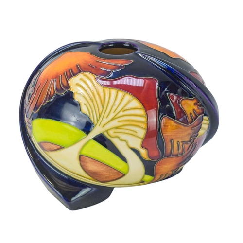 235 - A Moorcroft 'Parasol Dance' squat vase. Designed by Kerry Goodwin, date stamp for 2008, height 12cm,... 