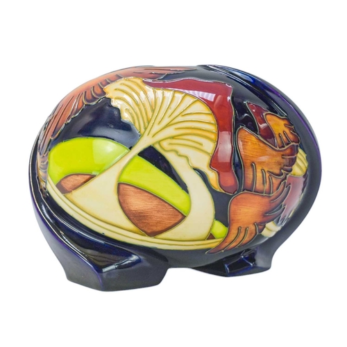 235 - A Moorcroft 'Parasol Dance' squat vase. Designed by Kerry Goodwin, date stamp for 2008, height 12cm,... 