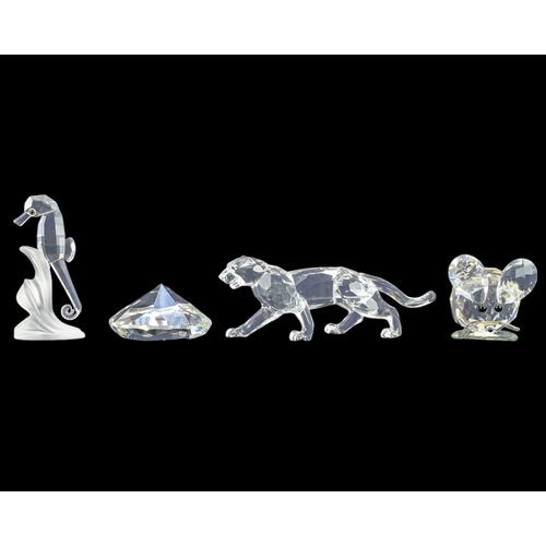 253 - Three pieces of Swarovski Crystal. Comprising a panther, a seahorse, and a mouse. The panther 13.5cm... 