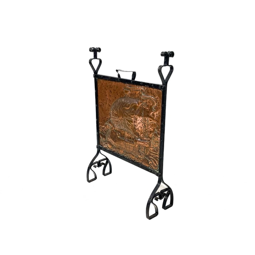 27 - An Arts and Crafts copper and wrought iron firescreen. Attributed to John Pearson, repousse decorate... 