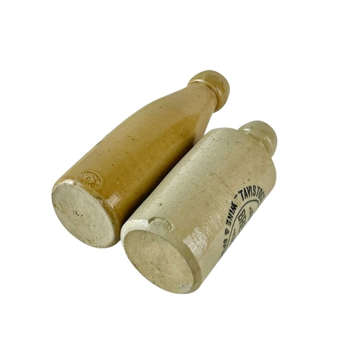 3 - A Tavistock Brewery Co stoneware ginger beer bottle. Height 17cm, together with an R. Williams & Co ... 