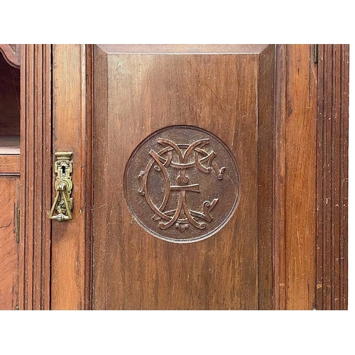 33 - Eastern Telegraph Company, A late Victorian walnut sideboard. Fitted with drawers and cupboards, the... 