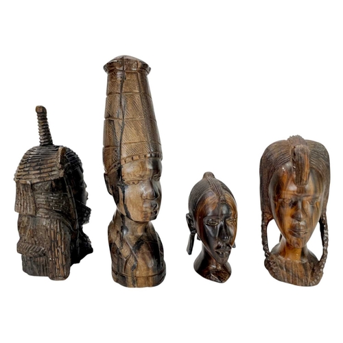 42 - Six African carved hardwood busts. Height 40cm and smaller.