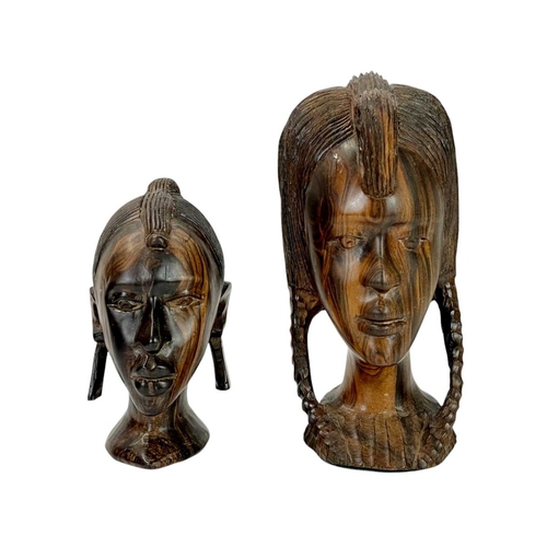 42 - Six African carved hardwood busts. Height 40cm and smaller.