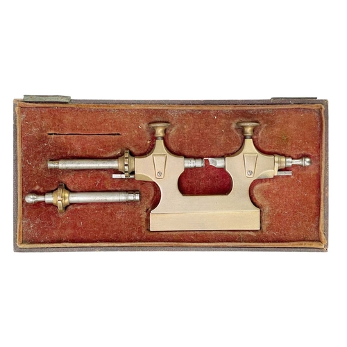 43 - A watchmaker's mandrel or 'Tour á Pivoter' tool, within a fitted case. French or Swiss, late 19th ce... 