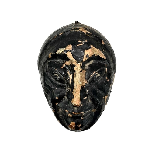 46 - A 20th century painted plaster wall mask. Inscribed 'Laughing Face F. Hill 19' on remnants of paper ... 