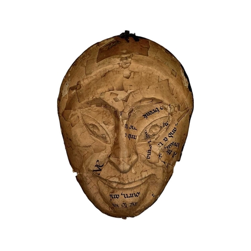 46 - A 20th century painted plaster wall mask. Inscribed 'Laughing Face F. Hill 19' on remnants of paper ... 