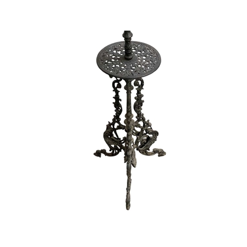 55 - A Victorian cast iron oil lamp stand. Height of stand 126cm, overall height 158cm.