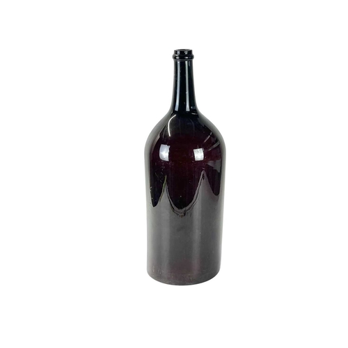 58 - A monumental blown brown glass bottle, Balthazar? 19th century, height 60cm.