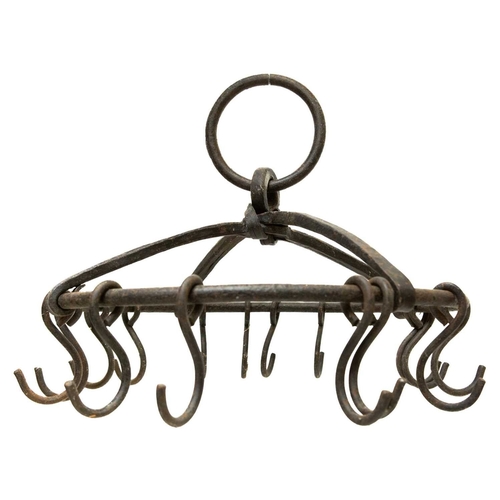 62 - A French wrought iron game hanger. With 16 hooks. Height 37cm.