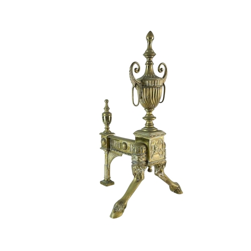 70 - A pair of ornate Neo-classical brass andirons. Early to mid 19th century, the urn finials with ring ... 