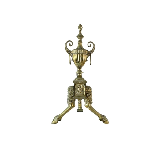 70 - A pair of ornate Neo-classical brass andirons. Early to mid 19th century, the urn finials with ring ... 