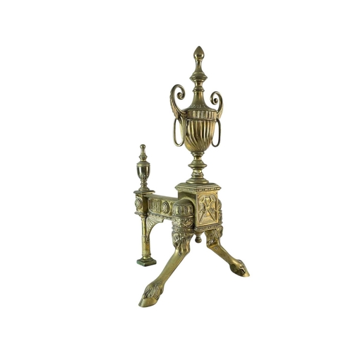 70 - A pair of ornate Neo-classical brass andirons. Early to mid 19th century, the urn finials with ring ... 