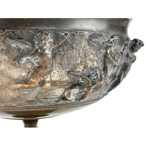 85 - A Ferdinand Barbedienne bronze tazza. France, 19th century, with twin lion mask mounted handles and ... 