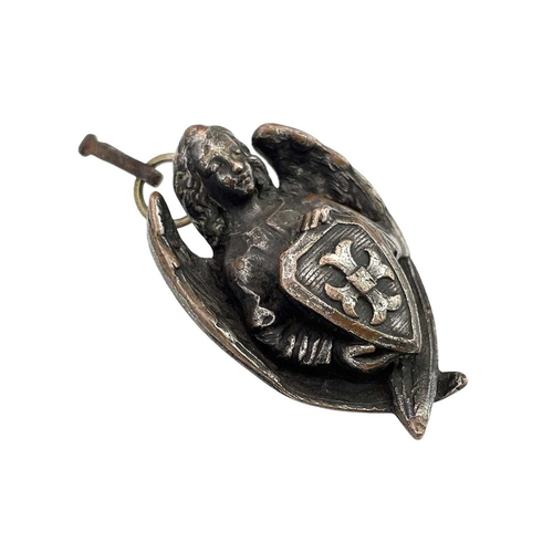 9 - A silvered bronze small pendant or mount. Probably 19th century, cast as an angel supporting a shiel... 