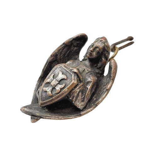 9 - A silvered bronze small pendant or mount. Probably 19th century, cast as an angel supporting a shiel... 