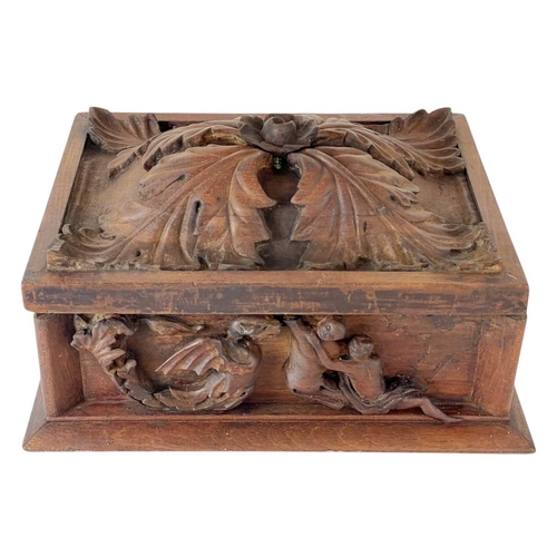 94 - An Eastern hardwood box. Carved with leafy scrolls, figures and beasts, height 20cm, width 36cm, dep... 