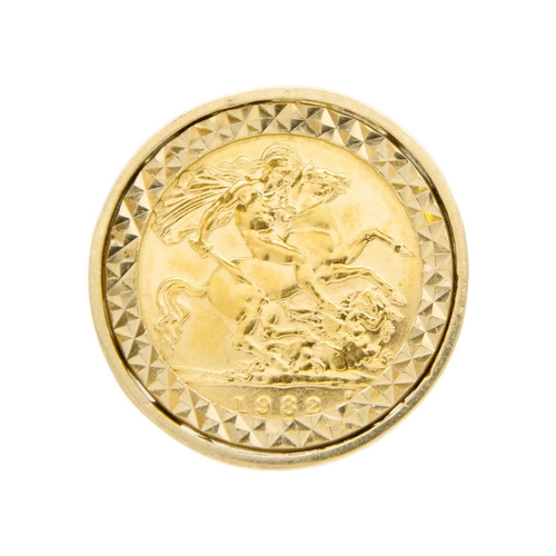 1 - A half sovereign set in a 9k gold ring. The ring is London hallmarked 1990, by LG&S, size U, total w... 