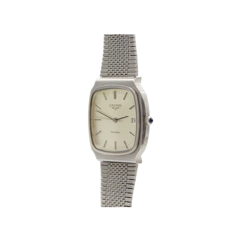 1038 - LONGINES - An automatic stainless steel gentleman's dress watch, cal. L 990.1. The silvered dial wit... 
