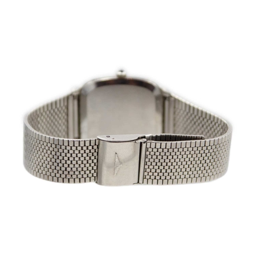 1038 - LONGINES - An automatic stainless steel gentleman's dress watch, cal. L 990.1. The silvered dial wit... 