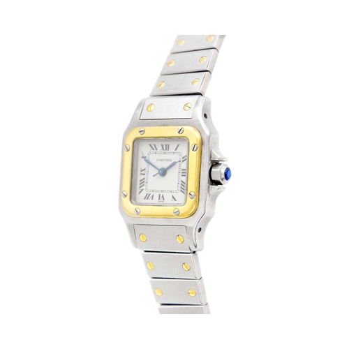 1051 - CARTIER - A Santos Carree stainless steel and gold lady's automatic bracelet wristwatch. The signed ... 