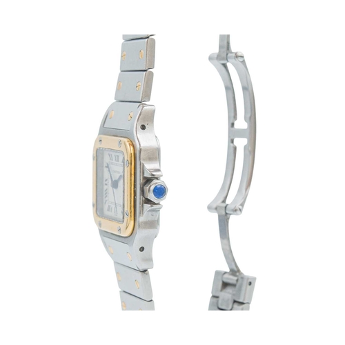 1051 - CARTIER - A Santos Carree stainless steel and gold lady's automatic bracelet wristwatch. The signed ... 