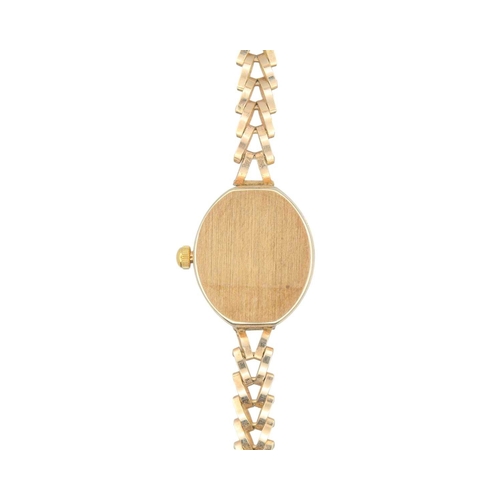 1085 - SOVEREIGN - A 9ct lady's quartz bracelet wristwatch. With signed silvered oval dial, Ronda 1 jewel m... 