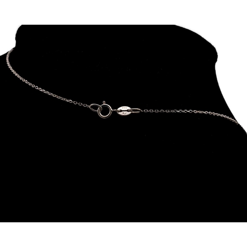 126 - An 18k gold pendant set with cultured golden pearl with yellow and white diamonds on a chain. The pe... 
