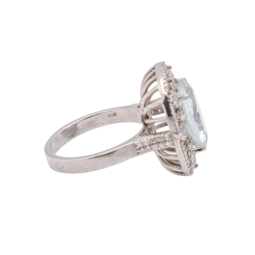 139 - An ornate silver aquamarine and diamonds set dress ring. The ring head is 2.2cm x 1.8cm, stamped 925... 